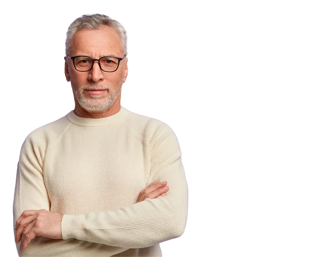 man with glasses and white sweater