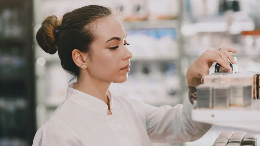 Pharmacist checking medicines