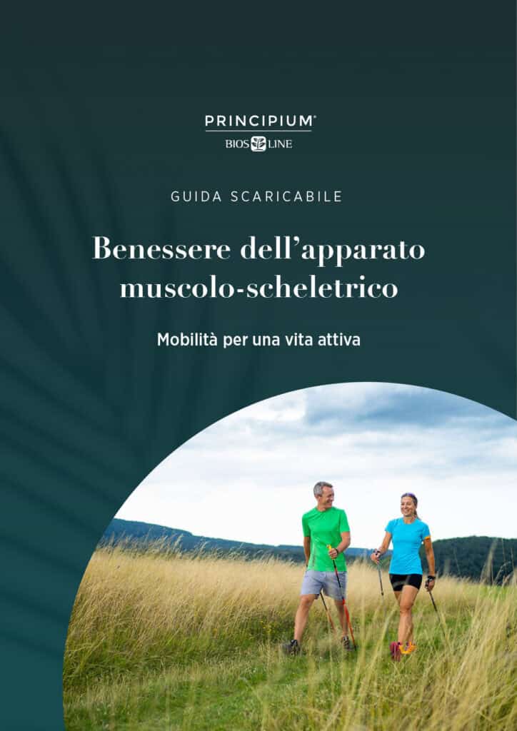 Copertina guida benessere muscolo-scheletrico, con titolo della guida e immagine di due persone che praticano nordic walking tra l’erba alta.